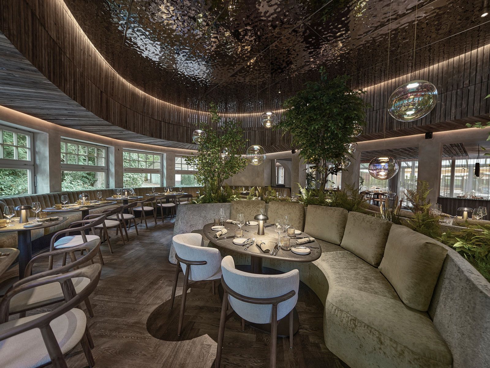 Gastronomie im Herzen des Stadtparks - Zu den H&ouml;hepunkten der Einrichtung z&auml;hlt die 25 Meter lange Sitzbank aus der Cramer M&ouml;belmanufaktur, die der ovalen Au&szlig;enwand des Raumes folgt.